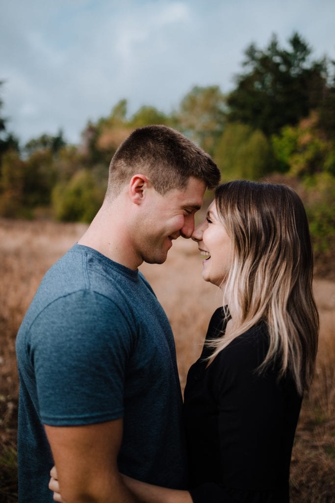 Elk lake couples session - couples laughing and snuggling 