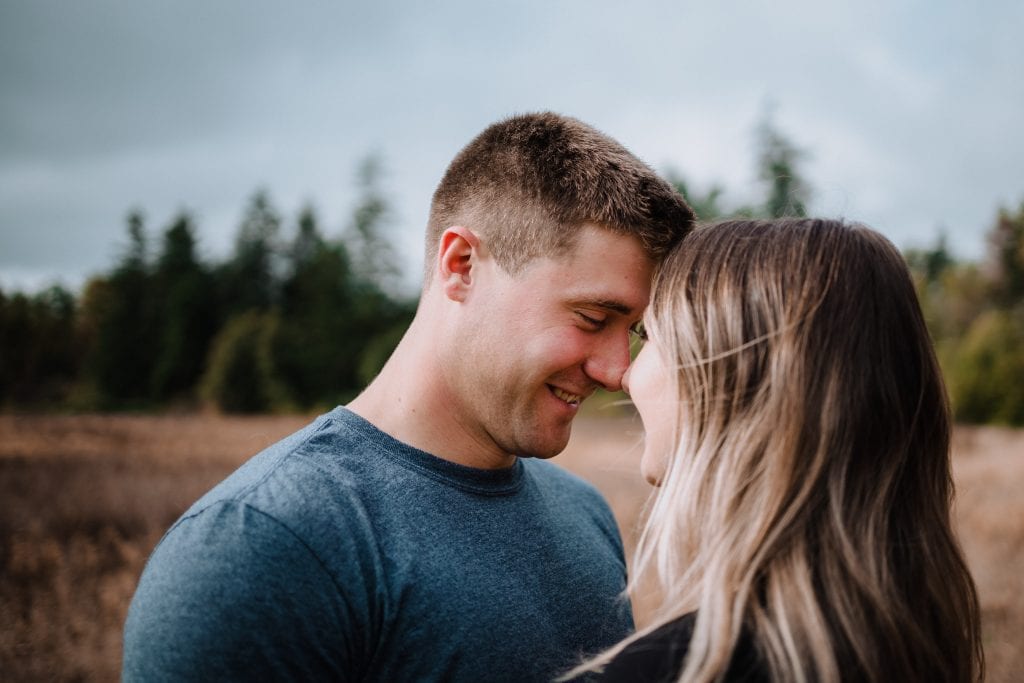 elk lake couples session - couple touching noses