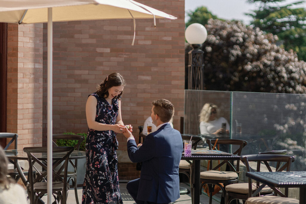 Victoria BC Proposal, ryan proposing to nicole on the gold lounge balcony at the fairmont empress